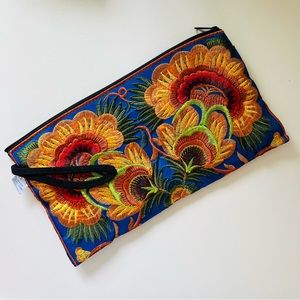 Sam Well floral embroidered wristlet clutch in blue